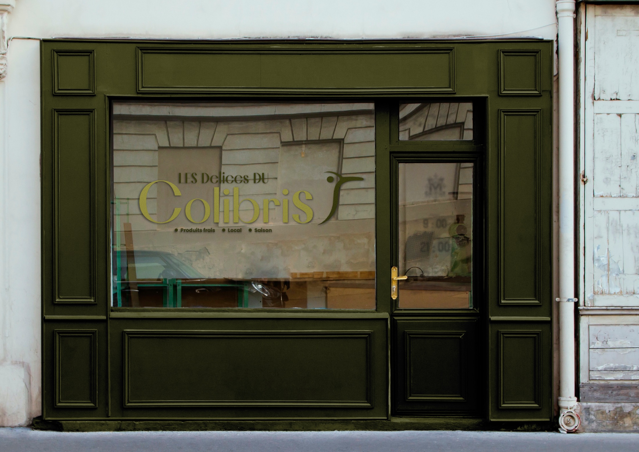 Les Délices du Colibri — devanture boutique vert profond